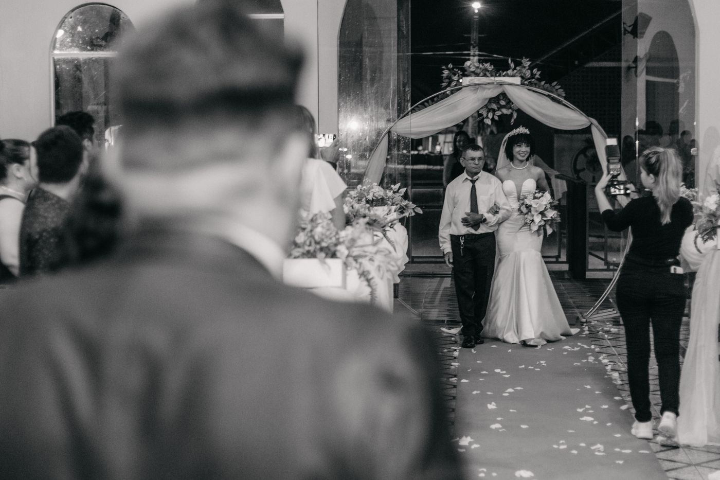 A bride walking down the aisle